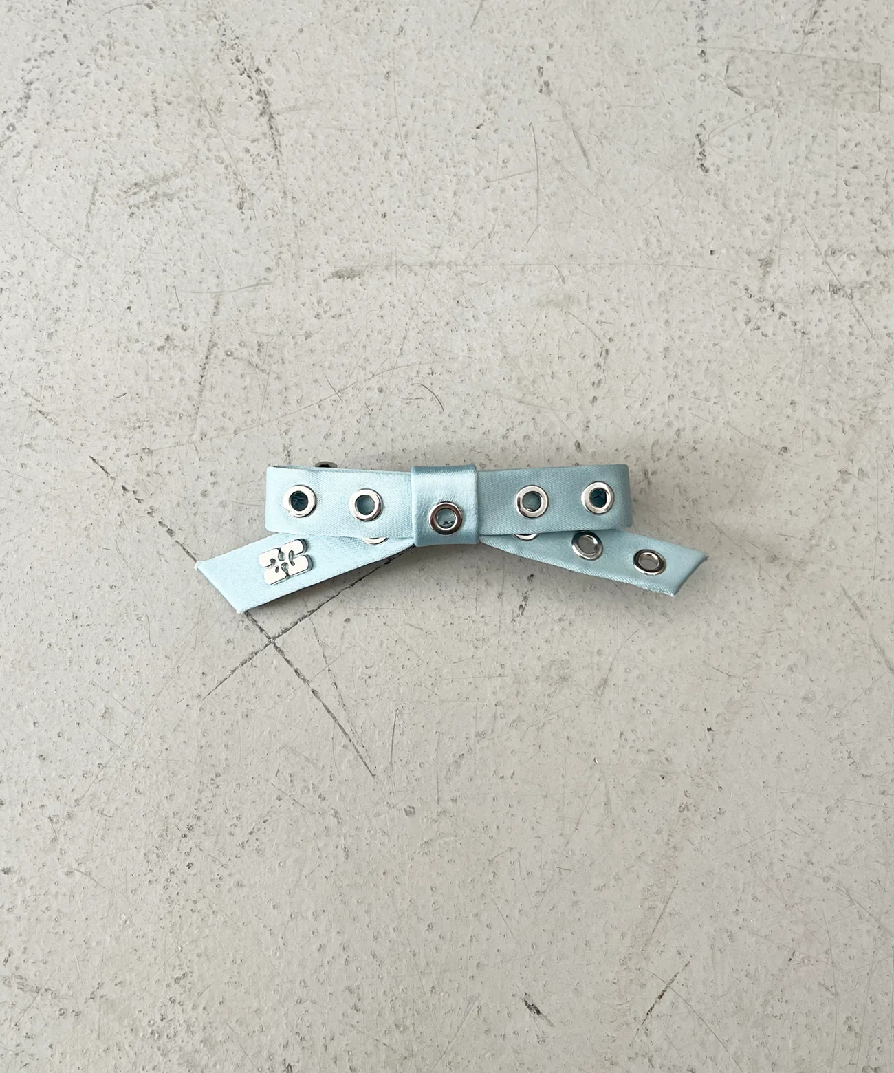 GANNI Eyelet bow barrette nylon "LEOPARD"