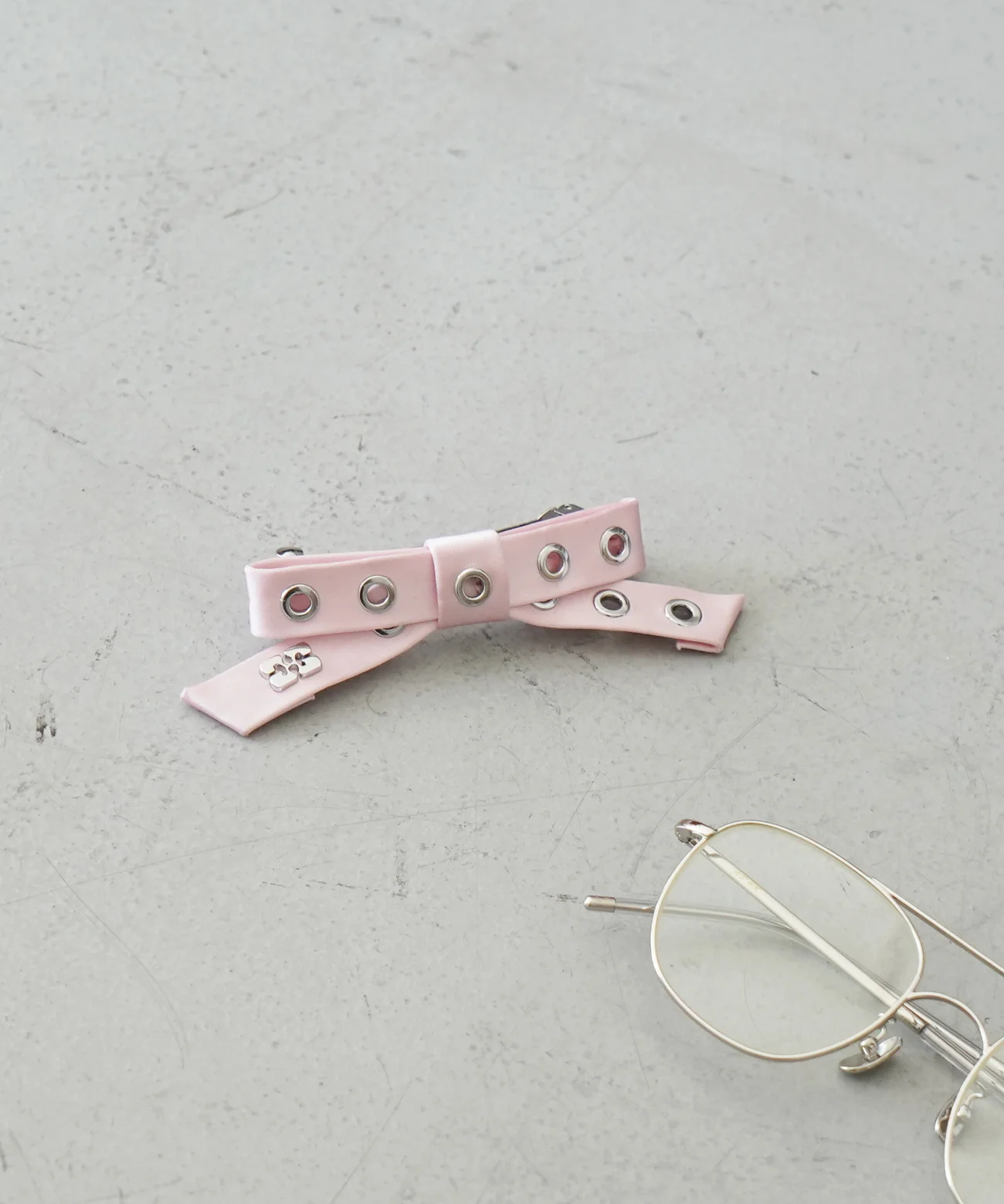 GANNI Eyelet bow barrette nylon "LEOPARD"