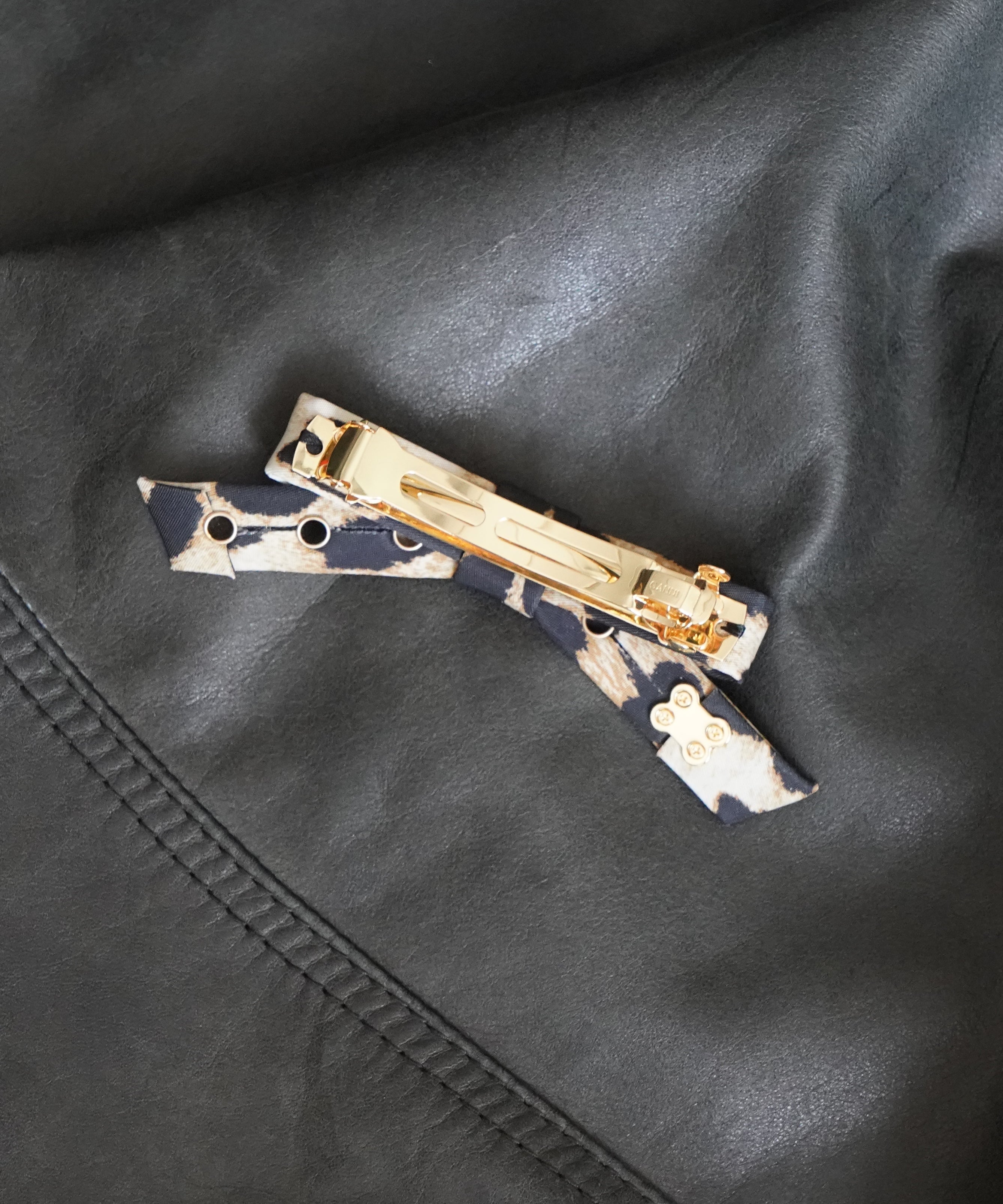 GANNI Eyelet bow barrette nylon "LEOPARD"