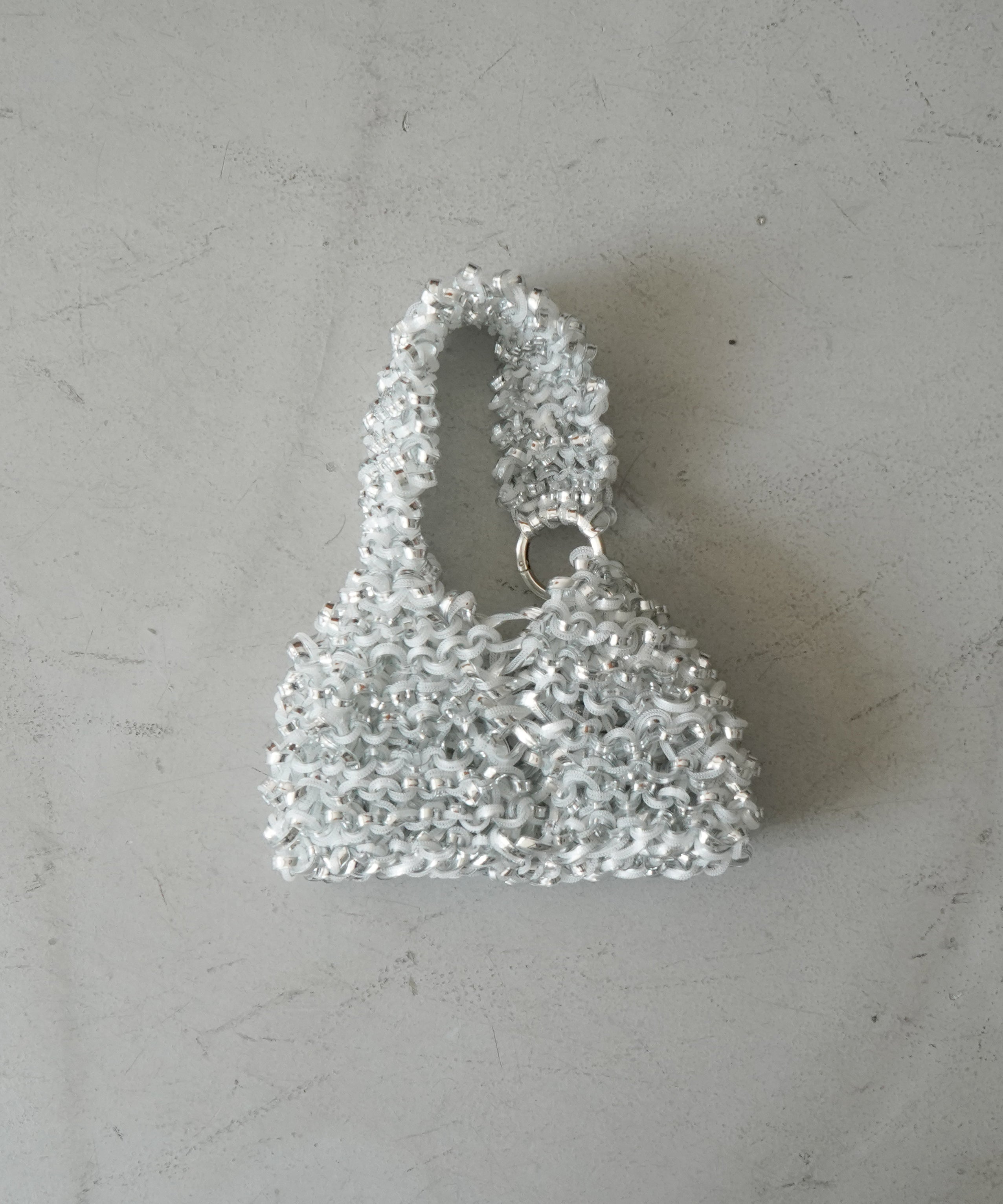 PROTCOL 'Grumo' tapeyarn hand bag "SILVER"