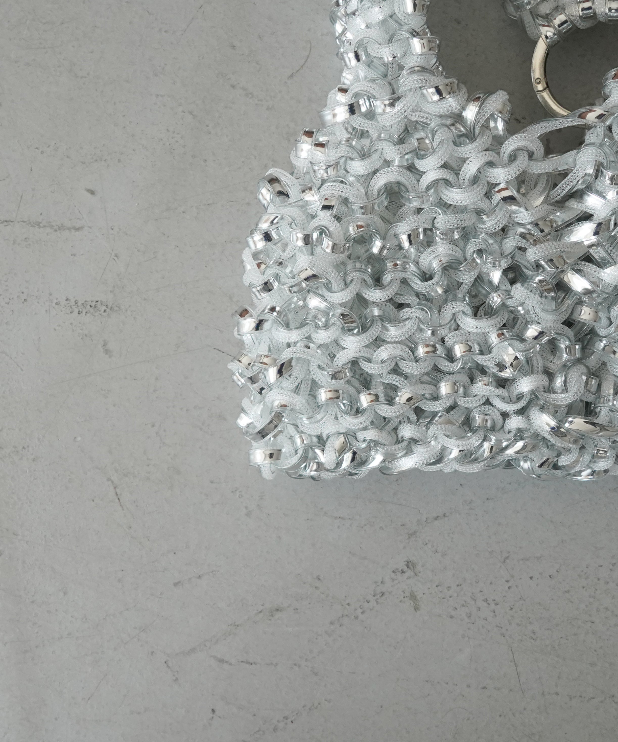 PROTCOL 'Grumo' tapeyarn hand bag "SILVER"