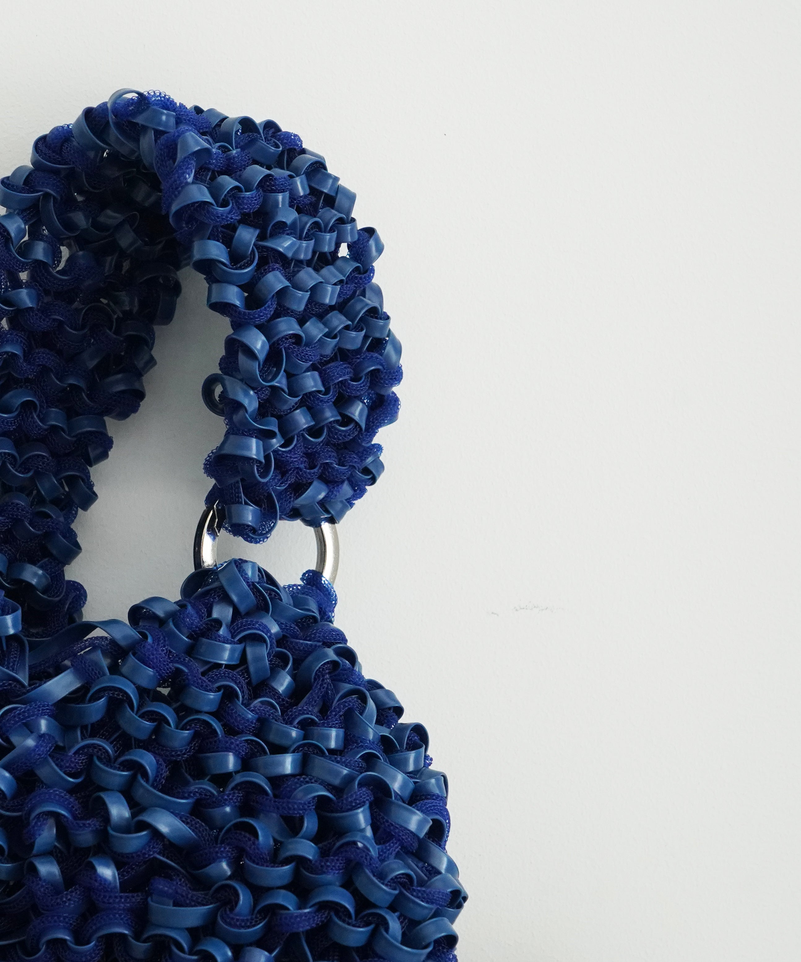 PROTCOL 'Grumo' tapeyarn hand bag "BLUE"