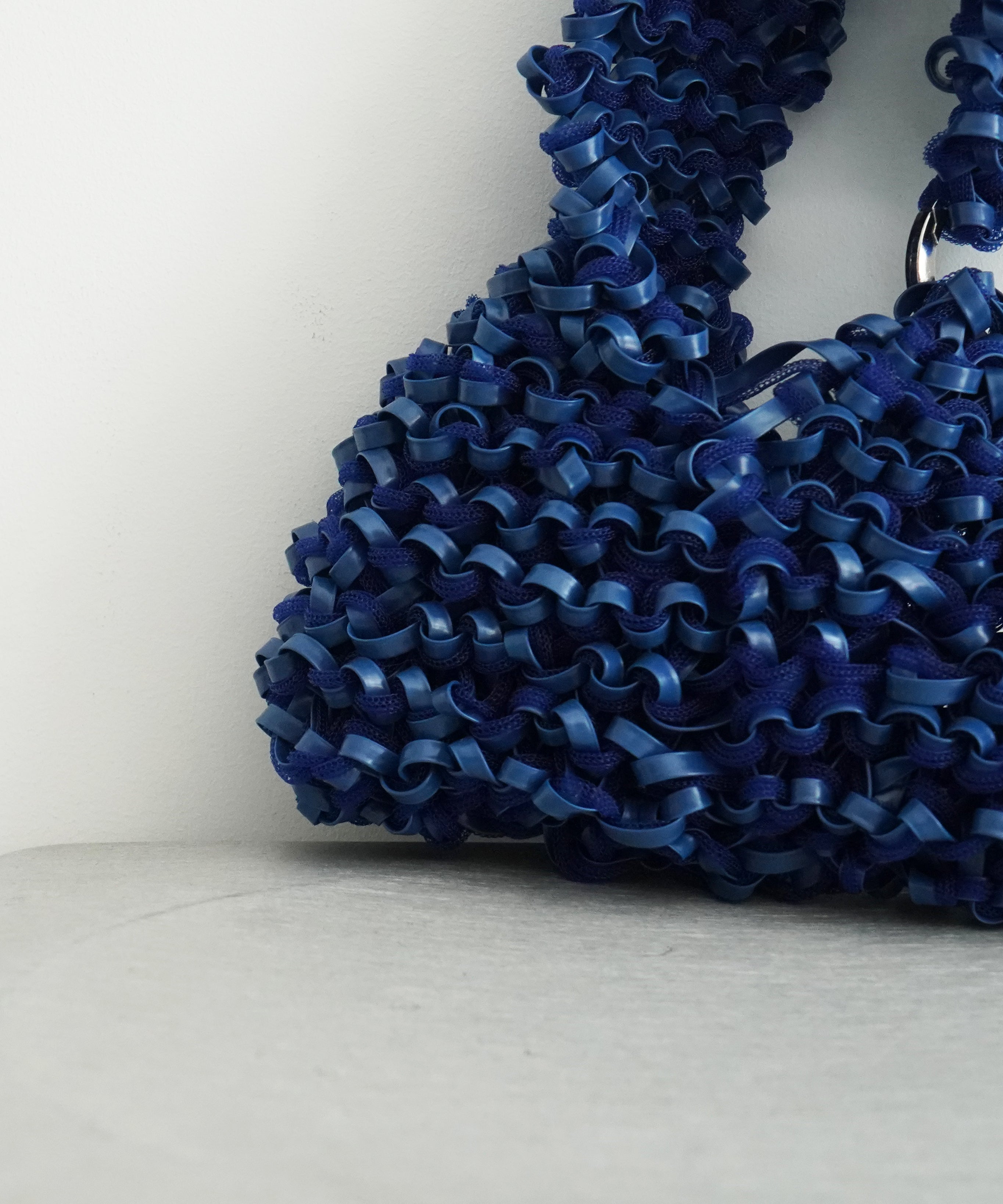 PROTCOL 'Grumo' tapeyarn hand bag "BLUE"