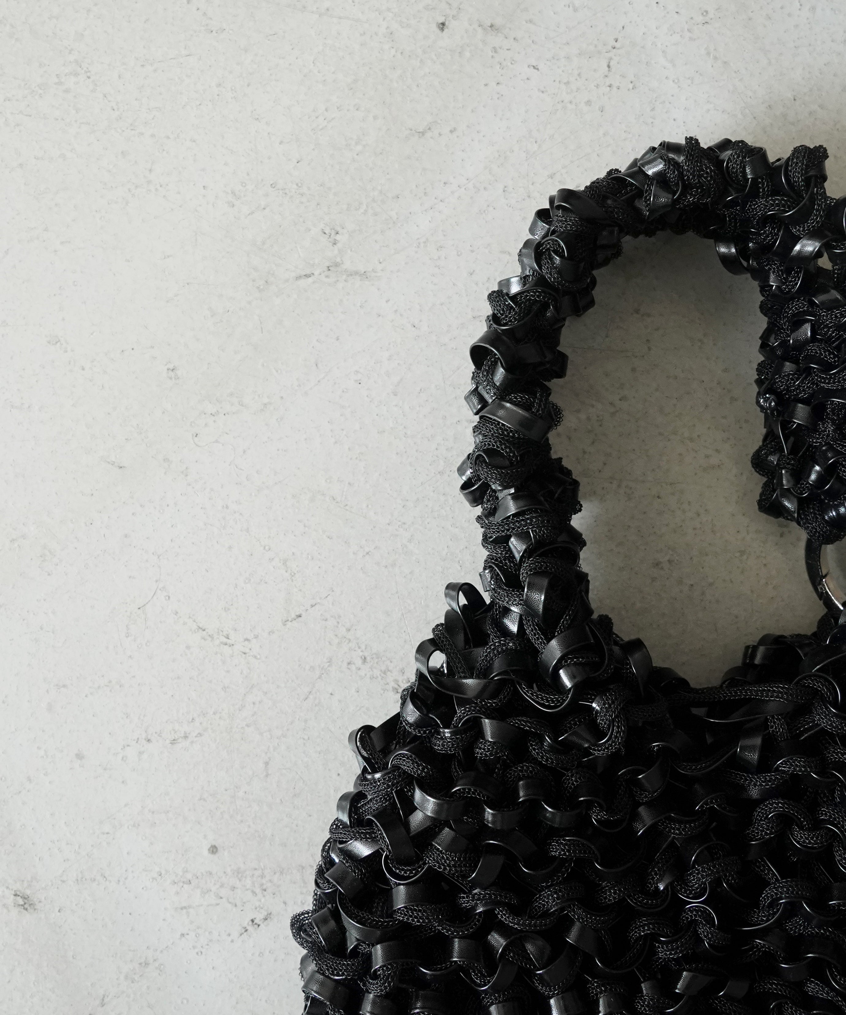 PROTCOL 'Grumo' tapeyarn hand bag "BLACK"