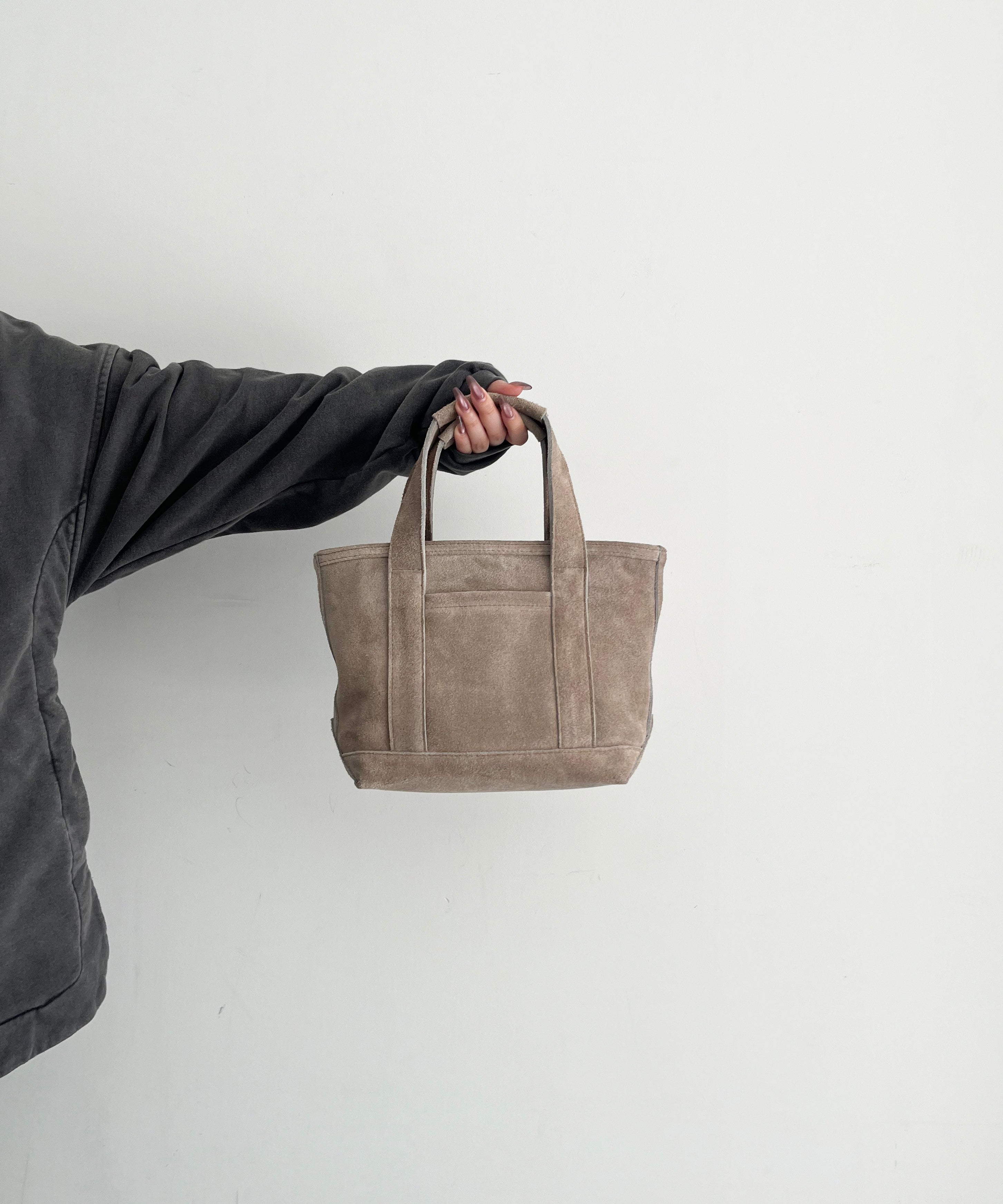 KAIKO Suede hand bag "SAND"