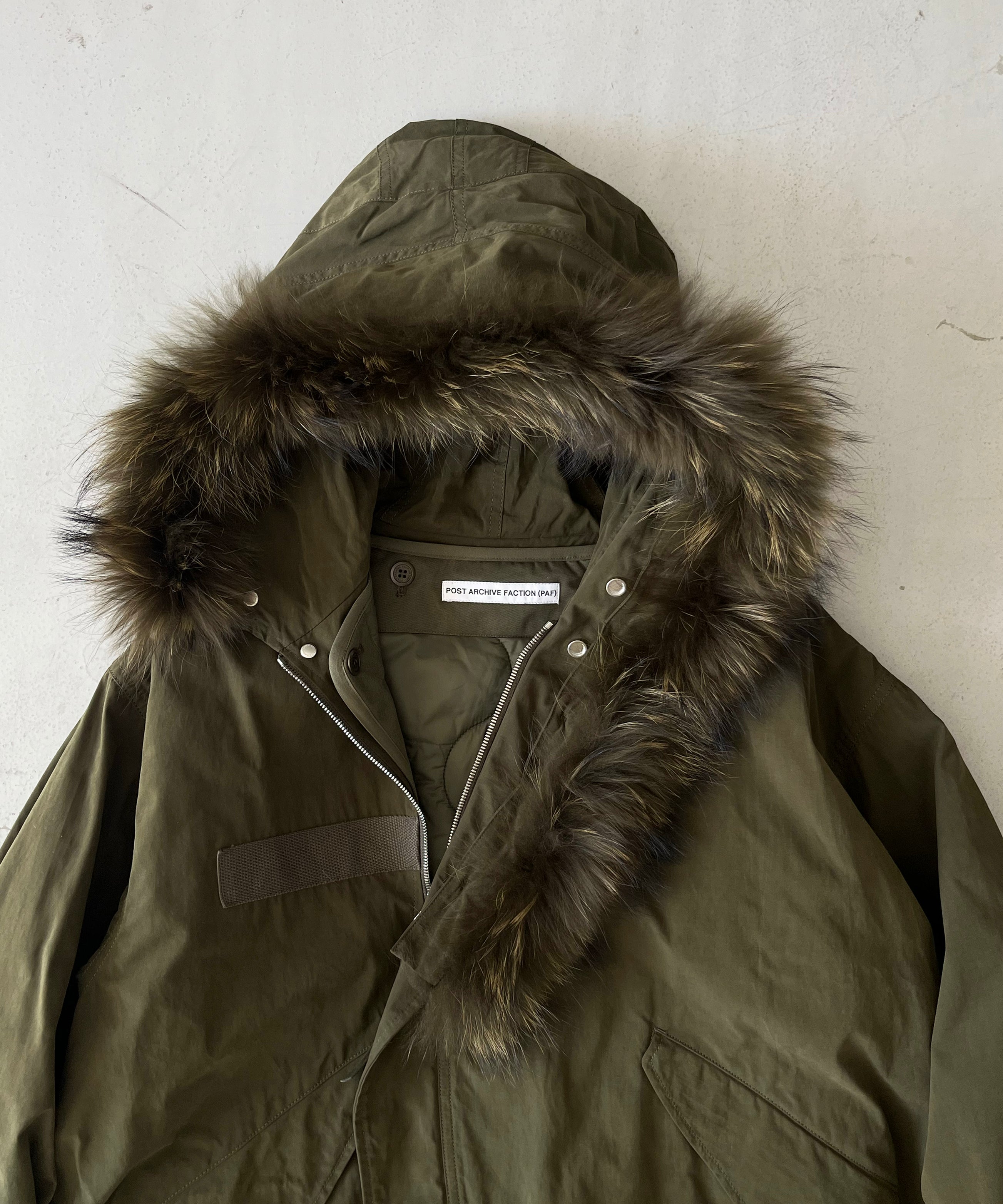 POST ARCHIVE FACTION(PAF) M66 parka "OLIVE GREEN"