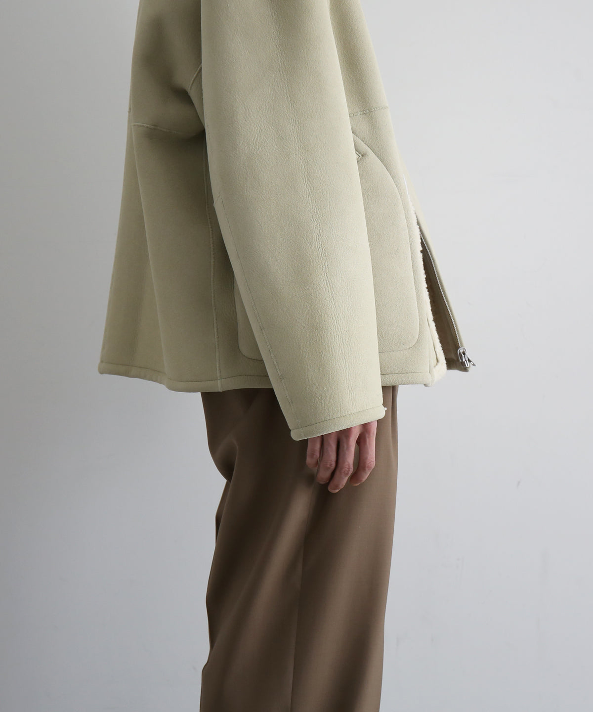 AURALEE Merino mouton zip blouson “IVORY LIME”