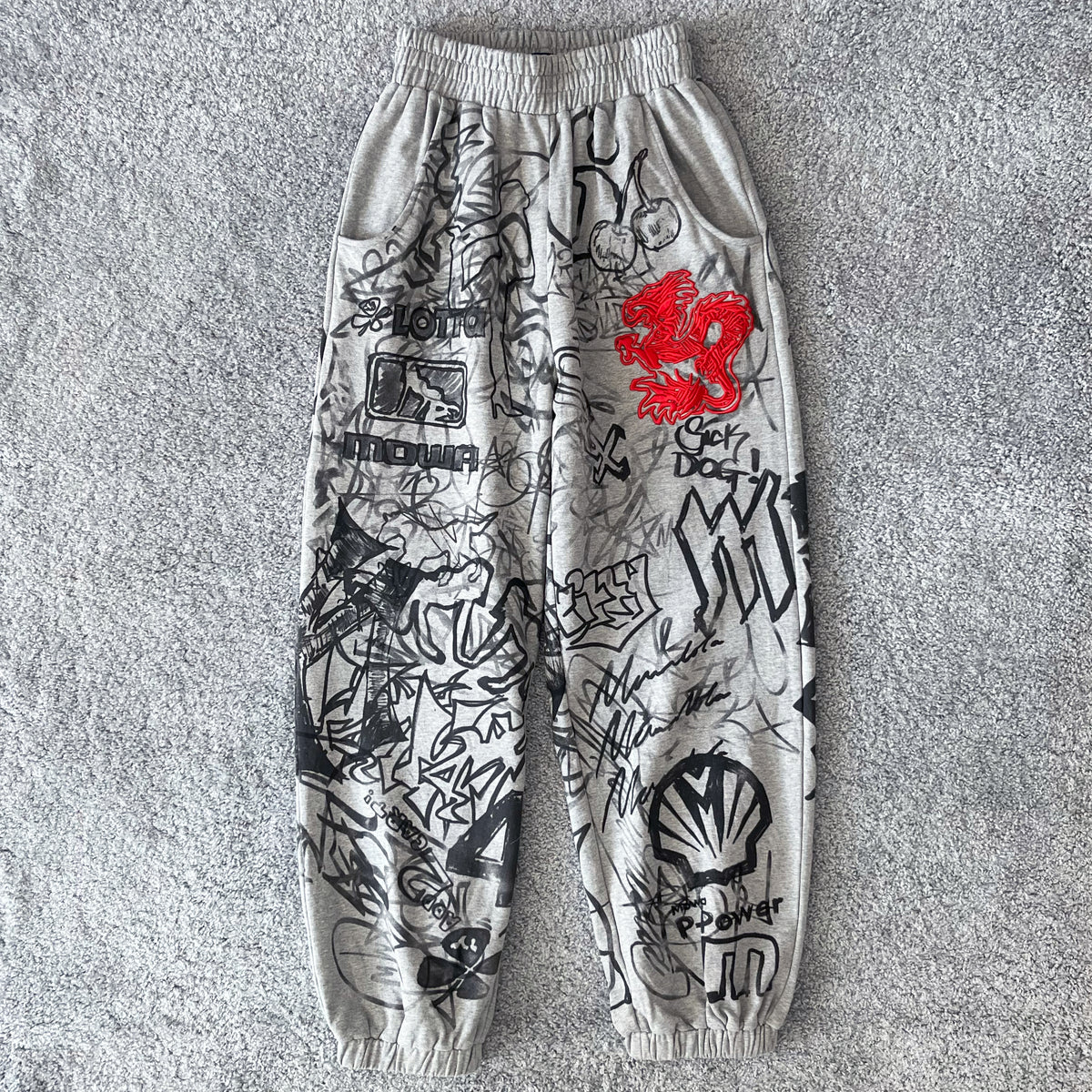 MOWALOLA【モワローラ】メンズ スウェットパンツ Grafitti track pant
