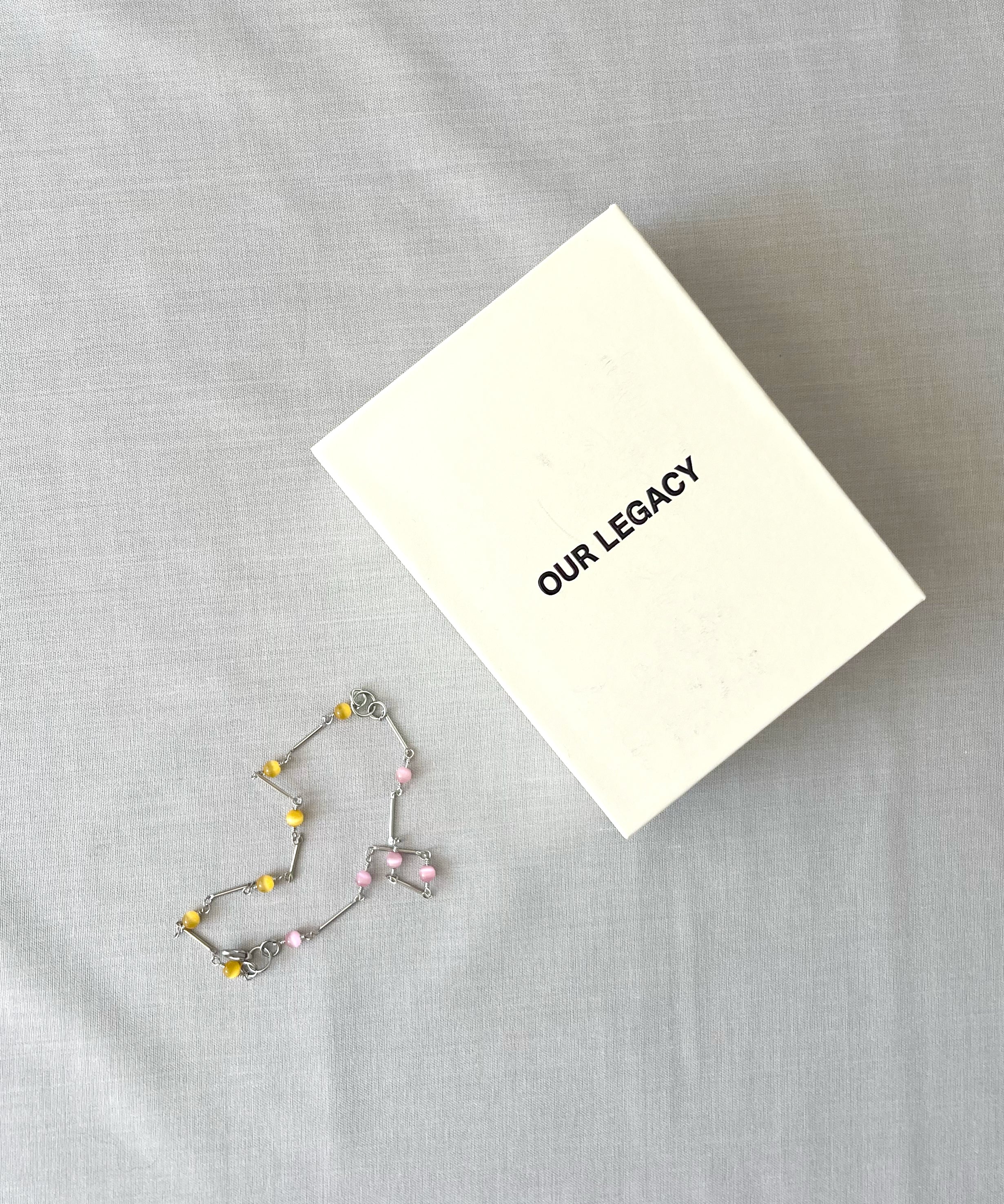 OUR LEGACY Fabricated pearl bracelet “MARBLED NECTAR BRASS LINK”