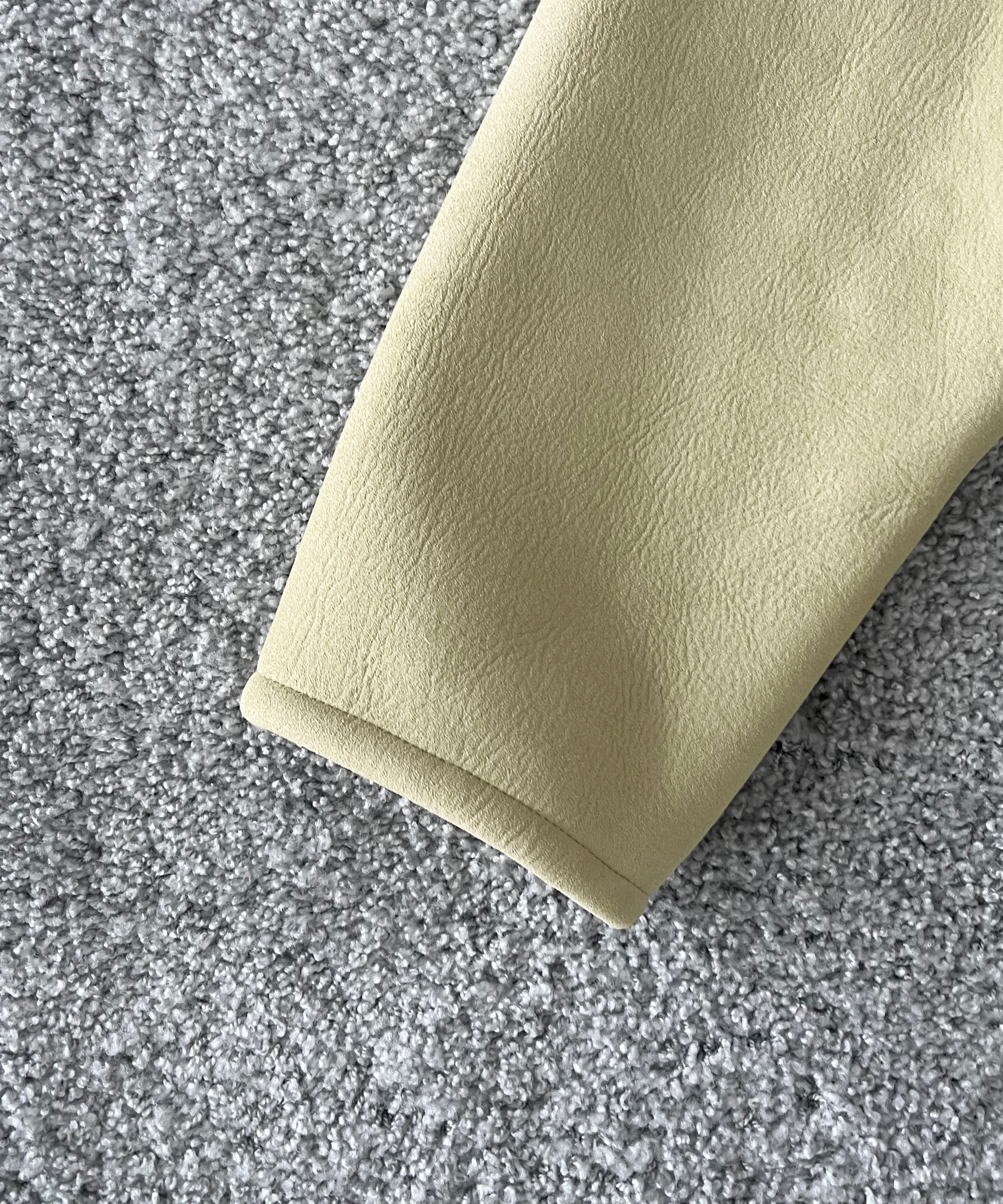AURALEE Merino mouton zip blouson “IVORY LIME”
