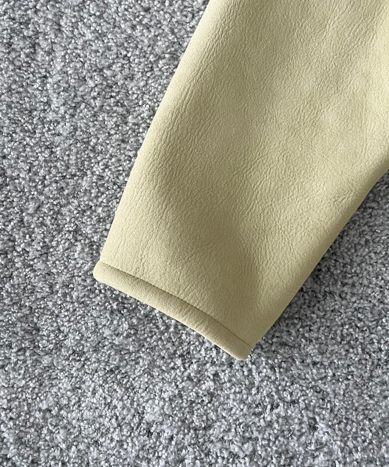 AURALEE Merino mouton zip blouson “IVORY LIME”