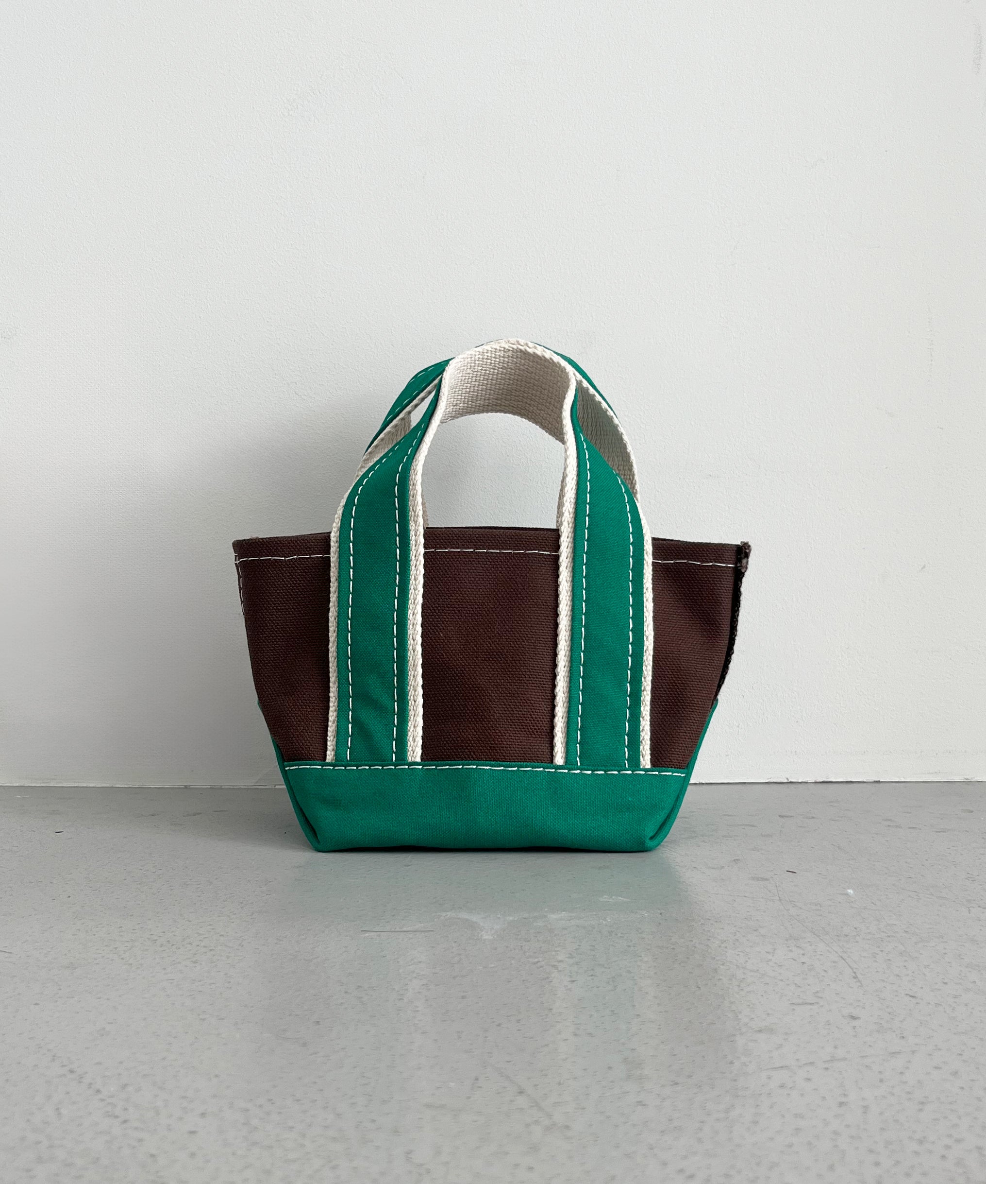KOOKY ZOO Kooky bag "NAVY×BROWN"