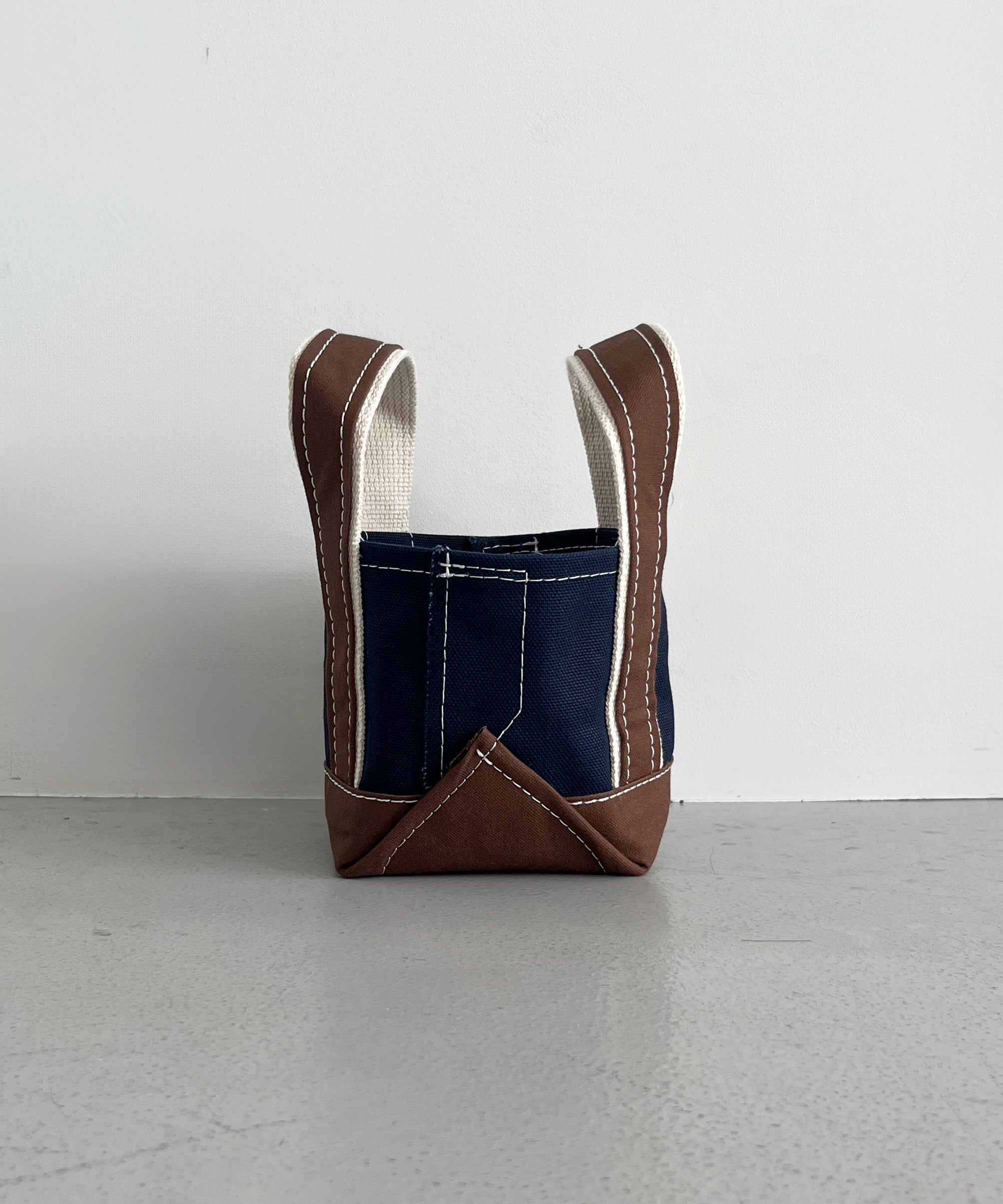 KOOKY ZOO Kooky bag "NAVY×BROWN"