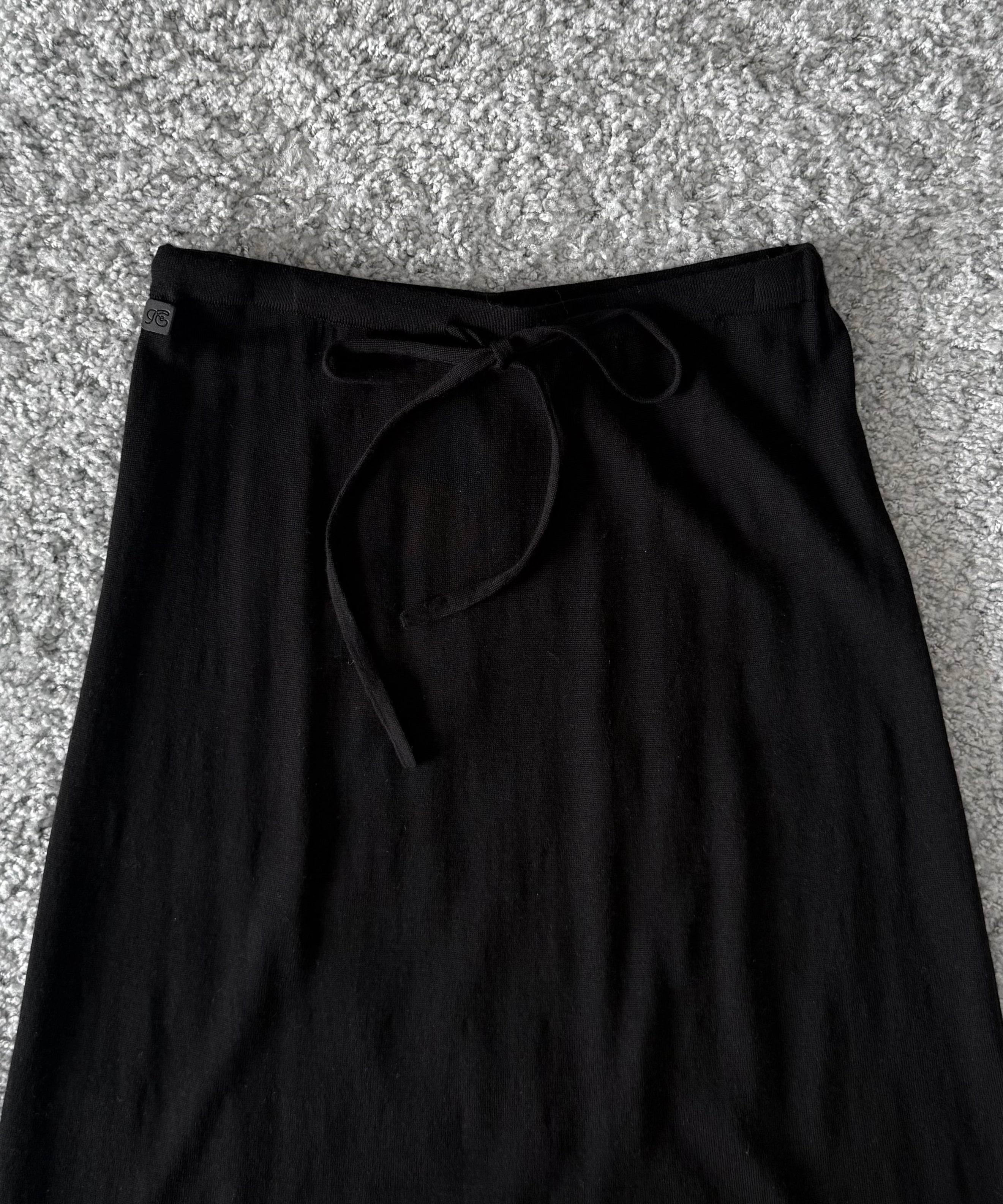 Fax Copy Express Afternoon stretch air ankle-length knit skirt "BLACK"